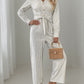 Striped Notched Long Sleeve Tie Waist Jumpsuit